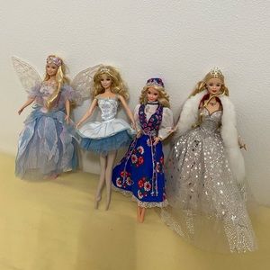 4 Barbie dolls